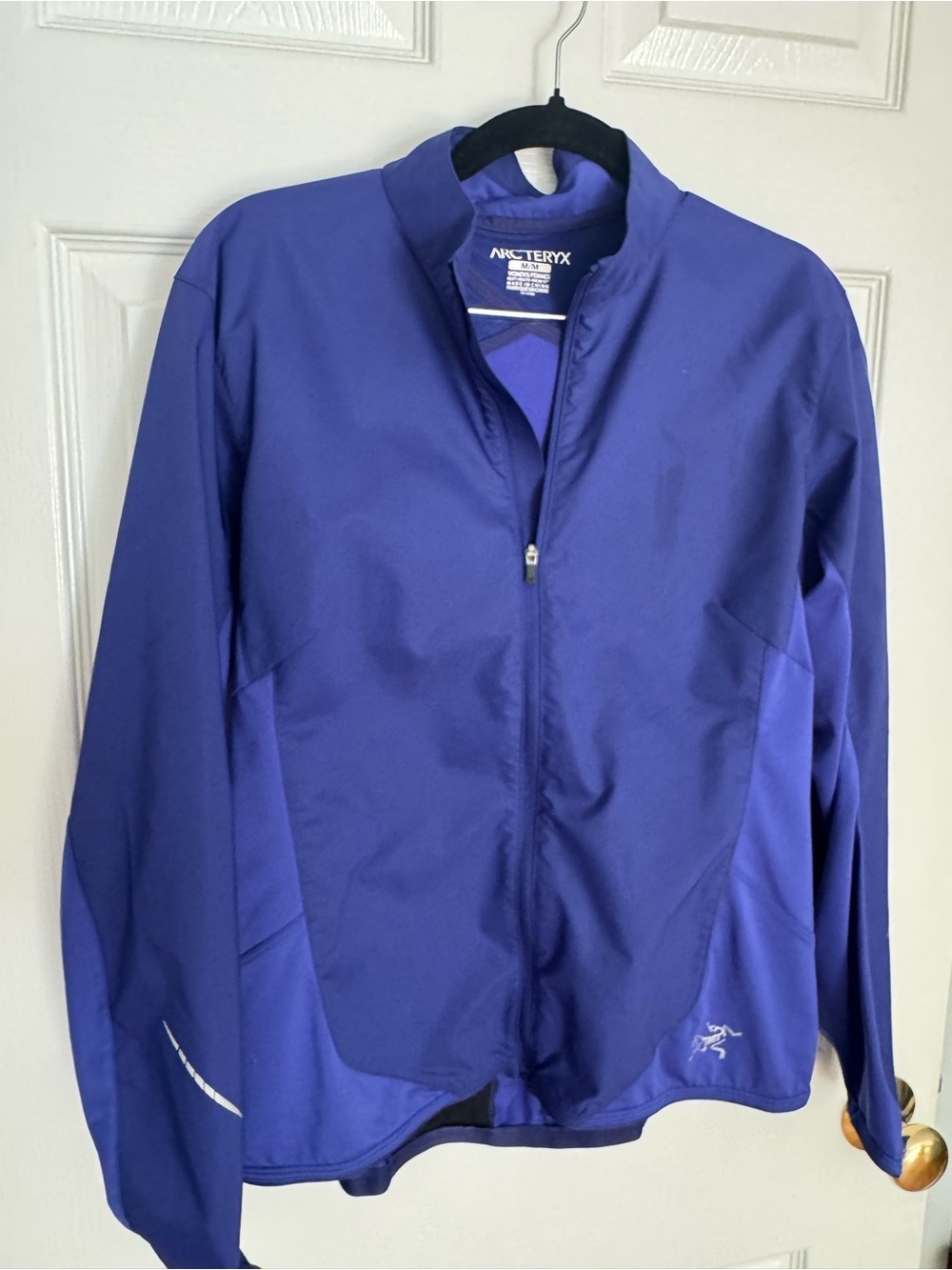 Arc'teryx Women's Royal Blue Full-Zip Running Jacket with zip back pockets